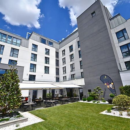 Aniroc Signature Hotel Arad Buitenkant foto The courtyard of the new building